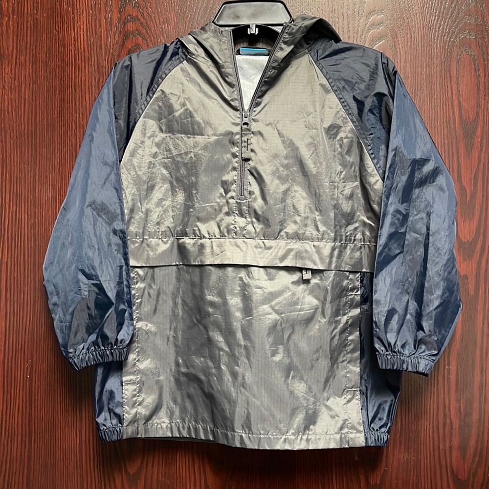 Children place pullover windbreaker.